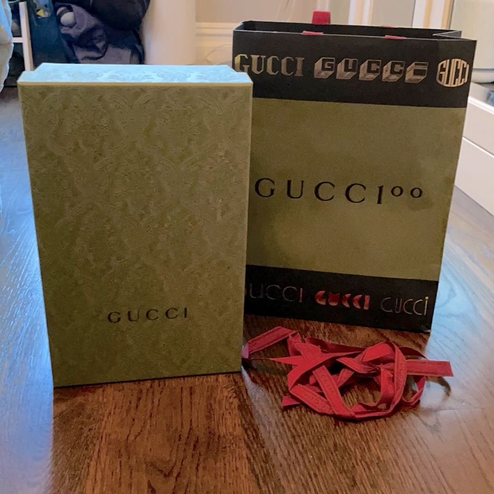 Gucci shoe box, shopping bag, and ribbon